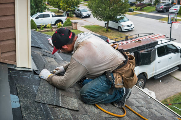 Professional Roofing technician working in Marlborough, MA